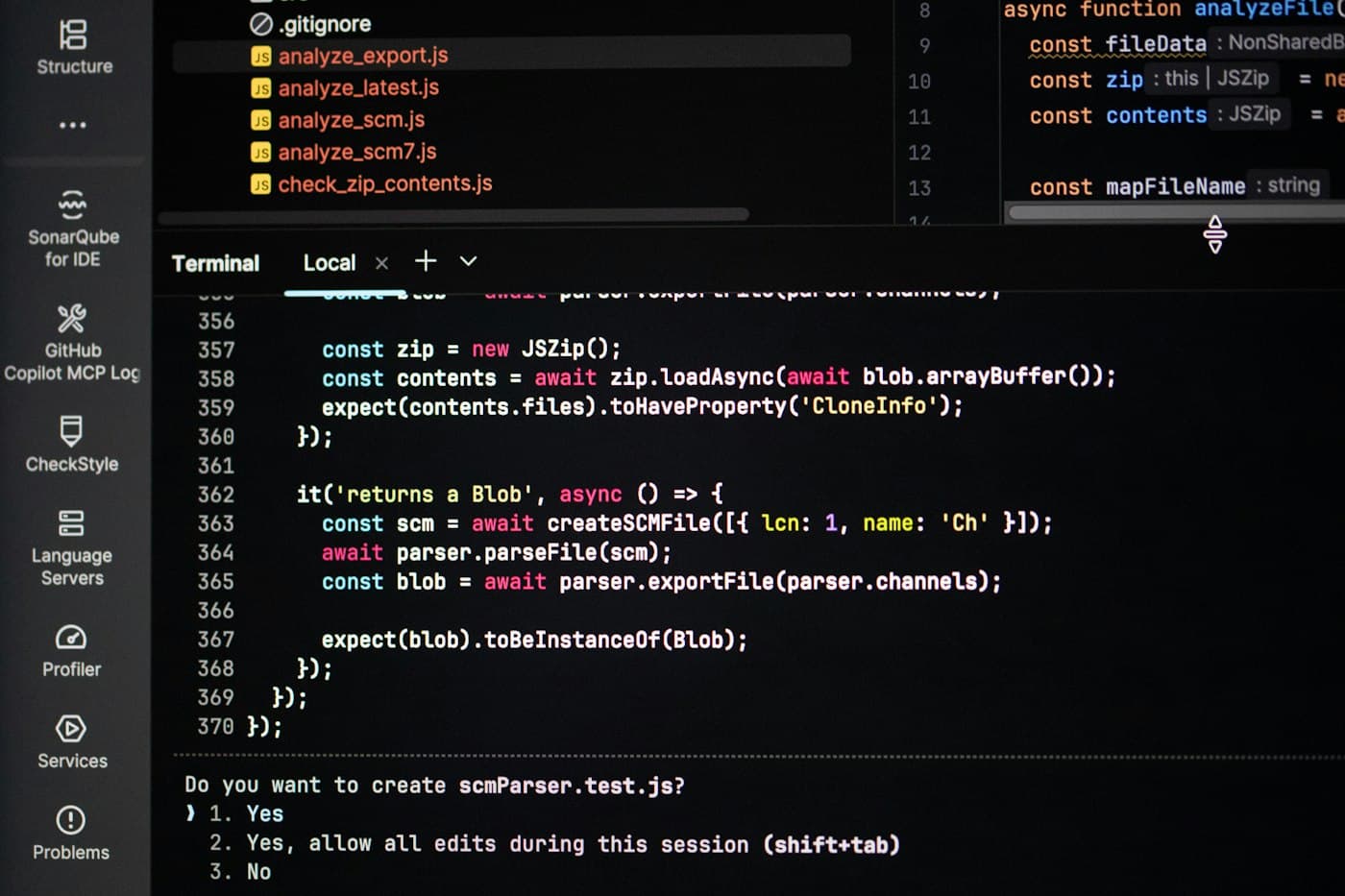 Code open in a dark-themed editor on a monitor